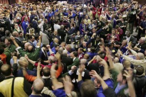 CHICAGO - MARCH 30:  Traders signal offers in the corn futures pit at the Chicago Board of Trade following the release of the USDA crop report March 30, 2007 in Chicago, Illinois. In response to the potential boom ethanol fuel U.S. farmers are expected to plant more acres in corn this year than any year since 1944.  (Photo by Scott Olson/Getty Images)